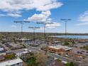 Aerial view shows the property is conveniently located near Edgewater Market and Sloans Lake at 1890 Eaton St, Lakewood, CO 80214
