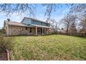 Expansive backyard with lush green grass, perfect for outdoor activities and relaxation at 4653 Kirkwood St, Boulder, CO 80301