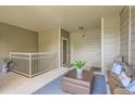 Inviting covered patio features comfortable seating and stylish decor, creating a relaxing outdoor space at 7462 S Quail Cir # 426, Littleton, CO 80127