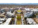 Stunning aerial view of community showcasing green spaces and modern architecture at 2958 Syracuse St # 306, Denver, CO 80238