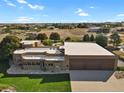 Expansive single story home with a three car garage and massive lawn at 4719 Beverly Ln, Erie, CO 80516