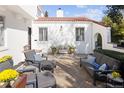 Charming patio area with comfortable seating, elegant decor, and a peaceful ambiance at 521 N Fairfax St, Denver, CO 80220