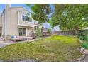 Expansive backyard with a well-maintained lawn, ideal for outdoor activities and relaxation at 11481 King St, Westminster, CO 80031