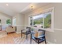 Bright living room with hardwood floors, large windows, and comfortable seating at 760 S 42Nd St, Boulder, CO 80305