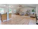 Spacious open floor plan with hardwood floors connecting the living, dining, and kitchen areas at 760 S 42Nd St, Boulder, CO 80305
