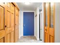 This inviting entryway features stylish wood-look floors and ample closet space at 14086 E Stanford Cir # F09, Aurora, CO 80015
