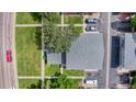 Aerial view of a well-maintained property with mature trees, green spaces, and convenient parking at 1216 S Uvalda St, Aurora, CO 80012
