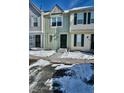 Charming townhouse exterior with two stories, well-maintained landscaping, and a welcoming entrance at 1641 S Idalia Cir # F, Aurora, CO 80017