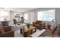 Bright living room boasts modern furnishings, dark wood floors, and is virtually staged at 5770 E Warren Ave # 206, Denver, CO 80222