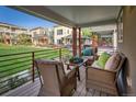 Relaxing front porch with comfortable seating and views of the landscaped front yard and neighborhood homes at 1231 Cedar Ave, Boulder, CO 80304