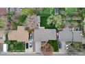 An aerial view directly overhead showing the house and the neighboring homes and trees at 1359 S Brentwood Way, Lakewood, CO 80232