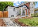 Inviting home exterior featuring a walkway, manicured lawn, and modern design at 1845 W 39Th Ave, Denver, CO 80211