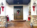 Elegant front entrance with decorative stone at 1696 Avian Ct, Lafayette, CO 80026