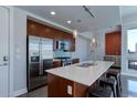 Modern kitchen features stainless steel appliances, white countertops and tile backsplash at 2460 W 29Th Ave # 303, Denver, CO 80211