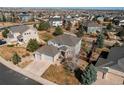 This aerial view shows a beautiful house in a well-planned neighborhood at 16590 Hitching Post Cir, Parker, CO 80134