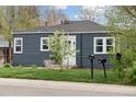 Inviting home with a neatly landscaped front yard, a decorative tree, and dual mailboxes on display at 3740 W 54Th Ave, Denver, CO 80221