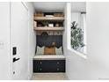 Charming entryway with coat storage and bench at 6795 E Arizona Ave # B, Denver, CO 80224