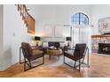 Cozy living room with modern furnishings, wood floors, and a neutral color palette at 942 S Walden St # 204, Aurora, CO 80017
