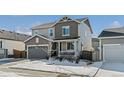 Two-story house with gray siding and a front yard at 27882 E 9Th Dr, Aurora, CO 80018