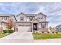 Beautiful home showcasing craftsman-style architecture, landscaping, and inviting front lawn at 6307 Saddle Bow Ave, Parker, CO 80134