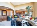 Open concept living room and kitchen with soaring ceilings at 16134 Sandstone Dr, Morrison, CO 80465