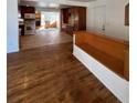 Open-concept living room with tile flooring and a partial view into the kitchen at 13430 Green Cir, Broomfield, CO 80020