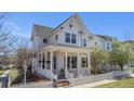 Beautiful two-story home featuring white columns on the porch and a well-maintained front yard at 11687 Newton St, Westminster, CO 80031
