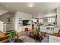 Spacious living area blending seamlessly into a modern kitchen, perfect for entertaining and everyday living at 4205 E Iliff Ave # 5, Denver, CO 80222