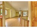 Bright living room with wood floors, fireplace and sliding glass door that provides ample natural light at 3100 S Corona St, Englewood, CO 80113