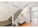 Bright staircase features patterned ceiling and a staircase with patterned carpet at 428 N Humboldt St, Denver, CO 80218