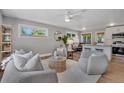 Open living room with modern furnishings, including comfortable seating and lots of natural light at 9400 Ridge Rd, Arvada, CO 80002