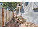 Charming front entrance and beautifully landscaped front yard at 10440 W 83Rd Ave, Arvada, CO 80005