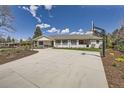 Stunning single-story home with a basketball hoop and large front yard, perfect for outdoor activities and curb appeal at 6102 S Aberdeen St, Littleton, CO 80120