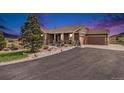 Charming single-Gathering home with rock accents, a well-manicured lawn, and a lovely walkway at 555 Heritage Trl, Elizabeth, CO 80107