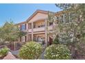 Beautiful condo with stone accents, lovely balconies, and well-maintained landscaping at 7160 S Wenatchee Way # F, Aurora, CO 80016