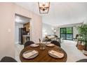 Cozy dining area adjacent to the living room and kitchen, perfect for casual meals at 7770 W 38Th Ave # 207, Wheat Ridge, CO 80033