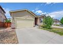 Inviting single-Gathering home showcasing a well-maintained lawn and a two-car garage at 675 W 171St Pl, Broomfield, CO 80023