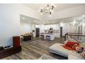 Open concept kitchen with island and stainless steel appliances at 11860 Sandcastle Ct, Parker, CO 80138