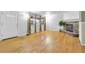 Spacious living room boasts gleaming hardwood floors and ample natural light at 9360 Lowell Blvd, Westminster, CO 80031