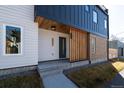Modern home exterior with a unique design, featuring a stylish entry and well-maintained landscaping at 3432 W 25Th Ave, Denver, CO 80211