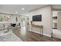 Bright living room features hardwood floors, contemporary decor, and ample natural light at 2856 S Kenton Ct, Aurora, CO 80014