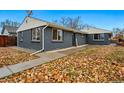 Charming single-story brick home with well-maintained landscaping and a concrete walkway leading to the front door at 1010 S Osceola St, Denver, CO 80219