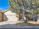 Well-maintained home with a two-car garage and mature landscaping at 9633 Brentwood Way # B, Broomfield, CO 80021