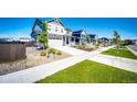 Charming two-story house with a two car garage, and beautiful landscaping at 129 S Waterloo St, Aurora, CO 80018