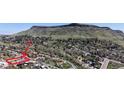 Aerial view showcasing the home's location in a neighborhood nestled against a mountain backdrop at 602 5Th St, Golden, CO 80403