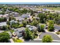 A view of the neighborhood, showcasing mature landscaping and residential charm at 12555 Eastlake Dr, Thornton, CO 80241