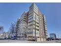 A multi-story apartment building with balconies on a sunny day at 1888 S Jackson St # 708, Denver, CO 80210