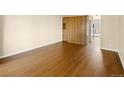 Spacious living area with hardwood floors, large closet, and neutral wall tones at 61 S Sable Blvd # C15, Aurora, CO 80012
