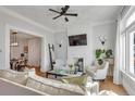 Cozy living room with a decorative fireplace, comfortable seating, and open layout at 748 Elati St, Denver, CO 80204