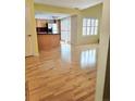 Bright living room features light hardwood floors and plenty of natural light at 13304 E Asbury Dr, Aurora, CO 80014